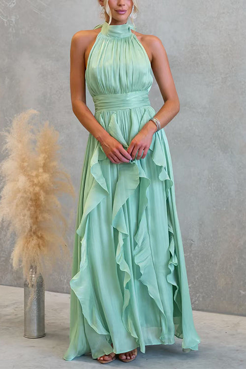 Vestido maxi con escote halter y volantes de caída fluida